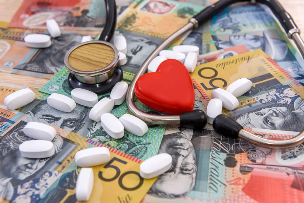 Money and medication, showing the problem associated with the cost of managing a chronic illness